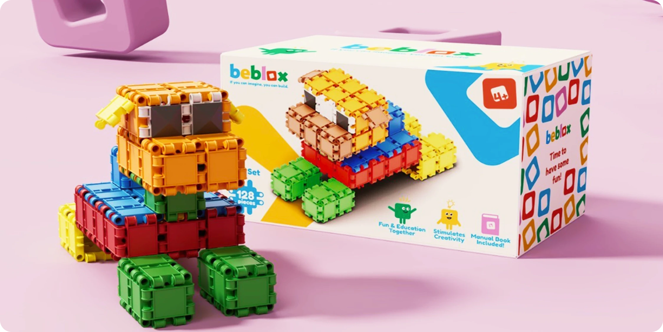 Beblox block builds and box on a pink background