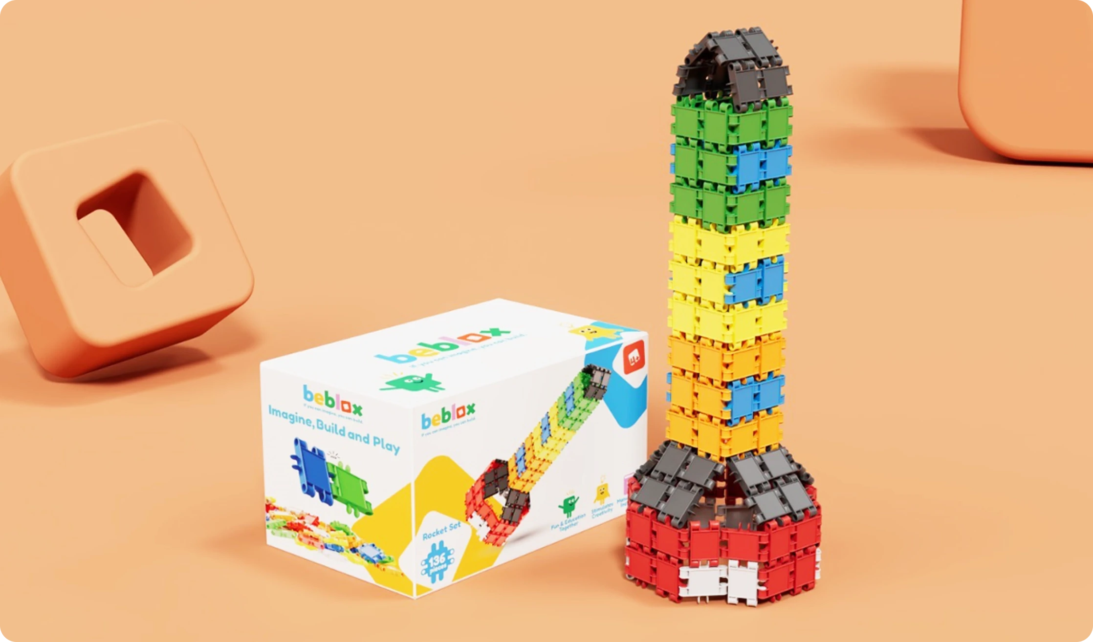 Tower built from Beblox blocks next to the box