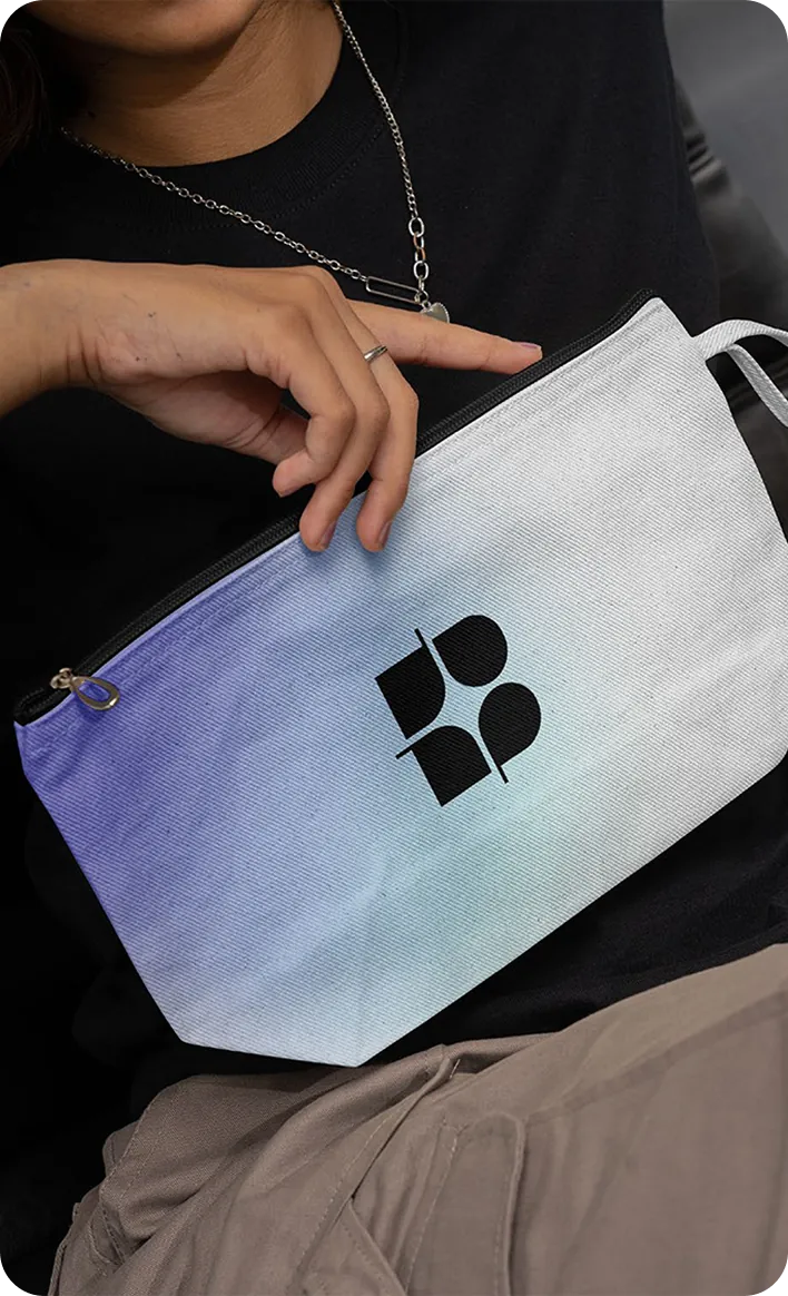 Brightvue cosmetic pouch held in hands
