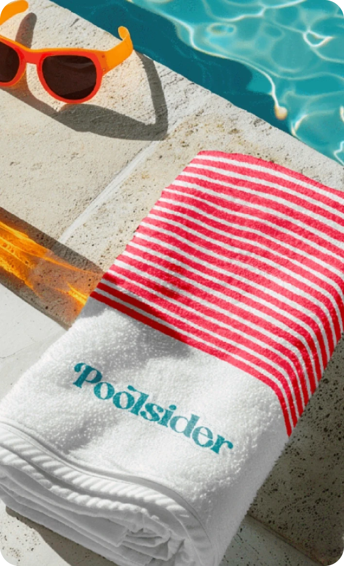 Pool Sider towel and sunglasses by the pool